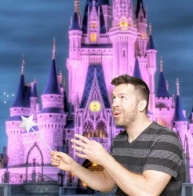 Guest posing with green screen tropical background