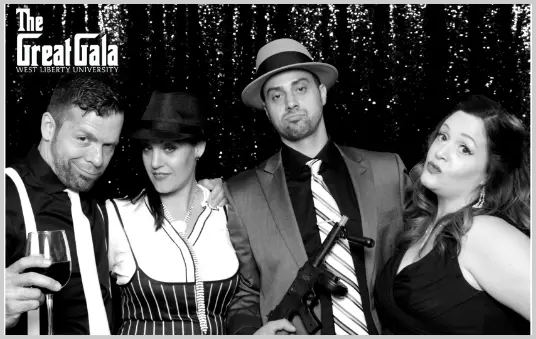 Guests posing at a corporate event photo booth